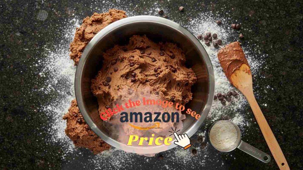 5qt mixing bowl overflows with thick cookie dough and scattered flour, showing its limit for big batch baking.