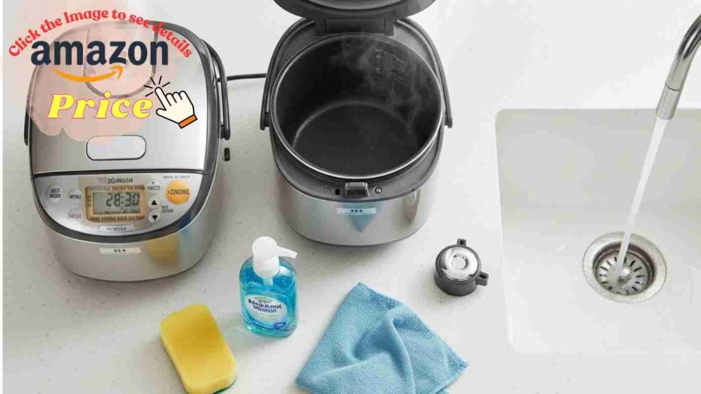 Cleaning scene: Cuckoo runs self-clean steam cycle on counter while Zojirushi lid and vent sit beside sponge for washing.