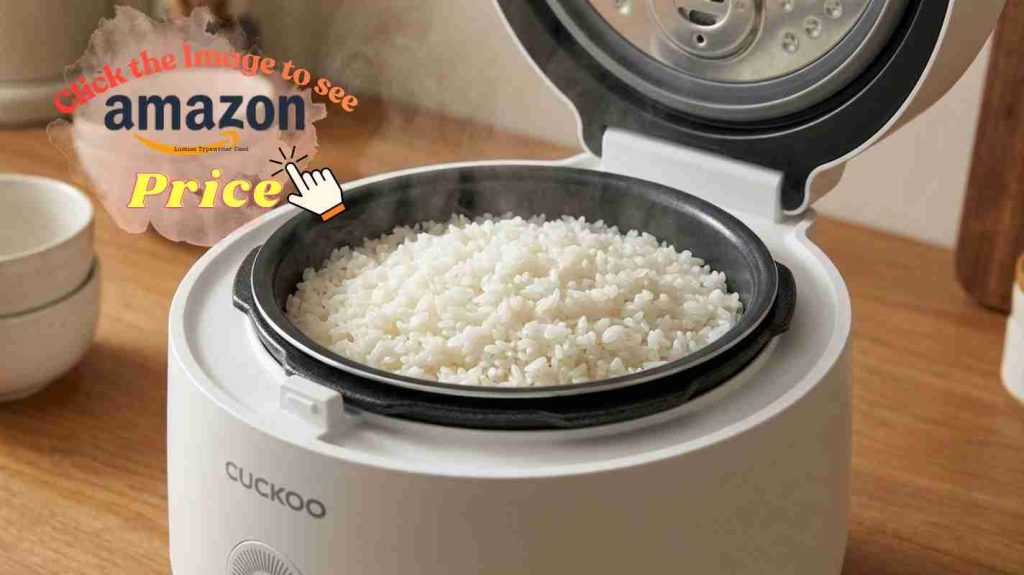 Cuckoo rice cooker with fluffy perfectly cooked white rice showing excellent grain separation and texture