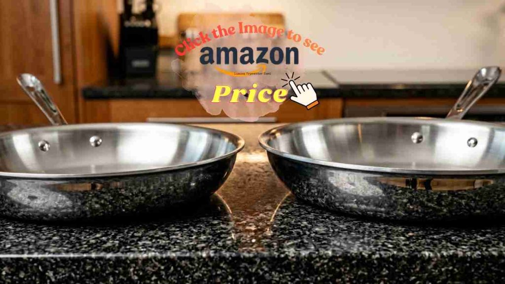 Tramontina Tri-Ply Clad and All-Clad D3 stainless skillets side-by-side on a modern kitchen counter.
