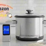 Rice cooker and clock showing speed on countertop.